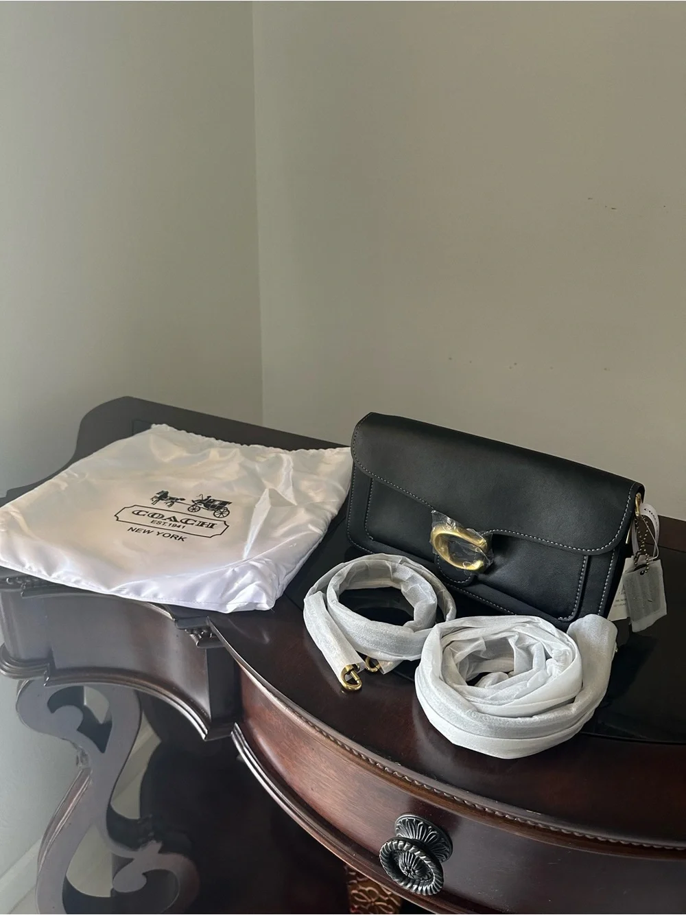 Coach Black Leather Shoulder Bag with Gold 'C' Accent
